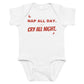 White baby bodysuit with Nap All Day. Cry All Night. printed in red on the front