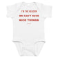 White baby bodysuit with I'm The Reason We Can't Have Nice Things printed in red on the front