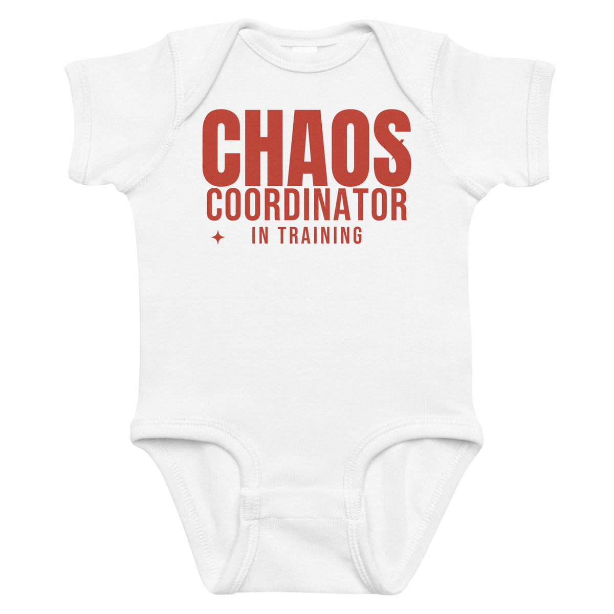 White baby bodysuit with Chaos Coordinator In Training printed in red on the front