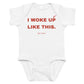 White baby bodysuit with I Woke Up Like This printed in red on the front