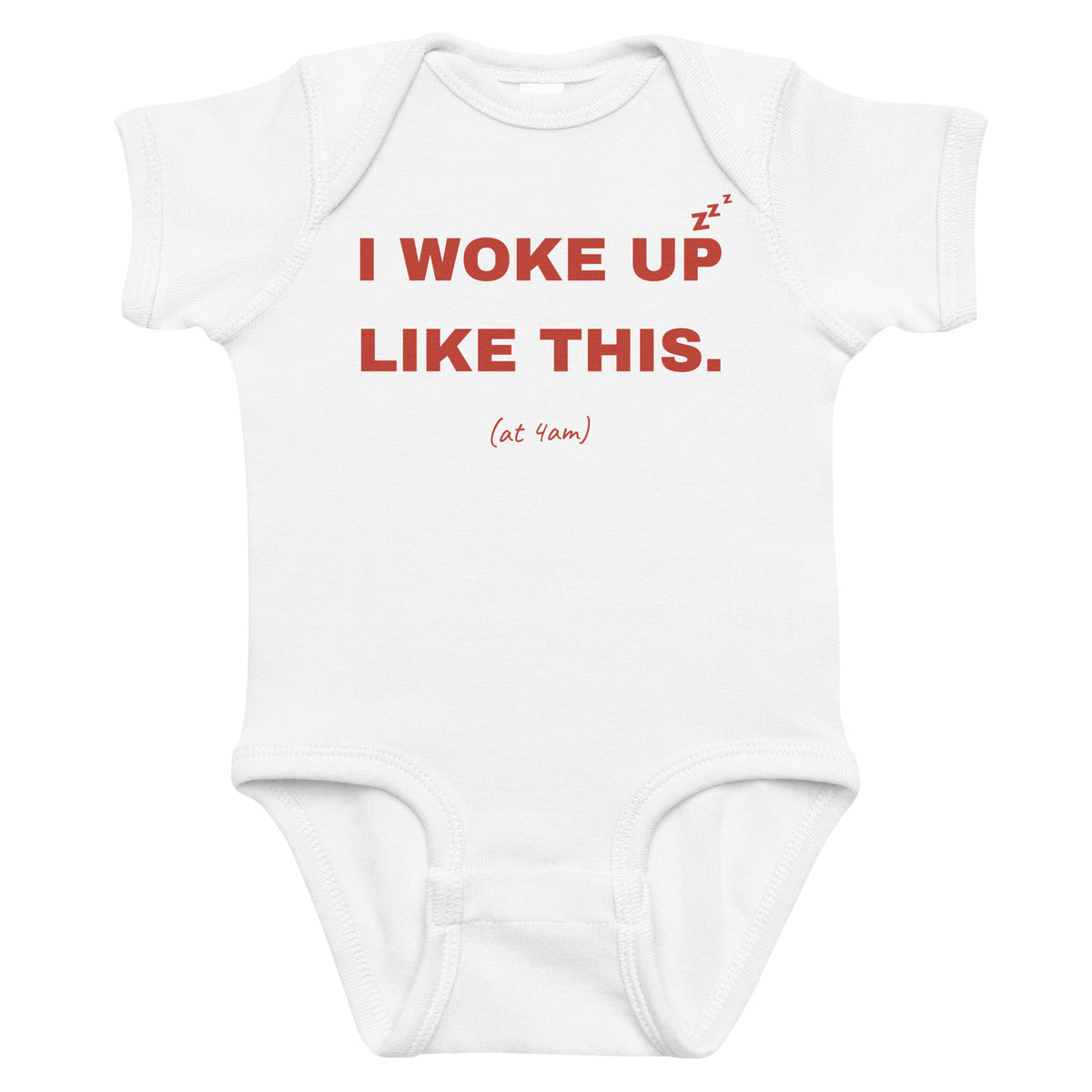 White baby bodysuit with I Woke Up Like This printed in red on the front