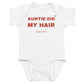 White baby bodysuit with Auntie Did My Hair (Blame Her) printed in red on the front
