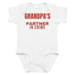 White baby bodysuit with Grandpa's Partner In Crime printed in red on the front