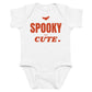 White baby bodysuit with Spooky But Cute printed in red on the front