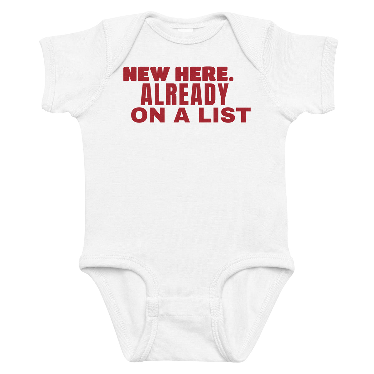 White baby bodysuit with New Here. Already On A List printed in red on the front
