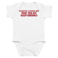 White baby bodysuit with Auntie Loves Me More Than Her Sleep Schedule printed in red on the front