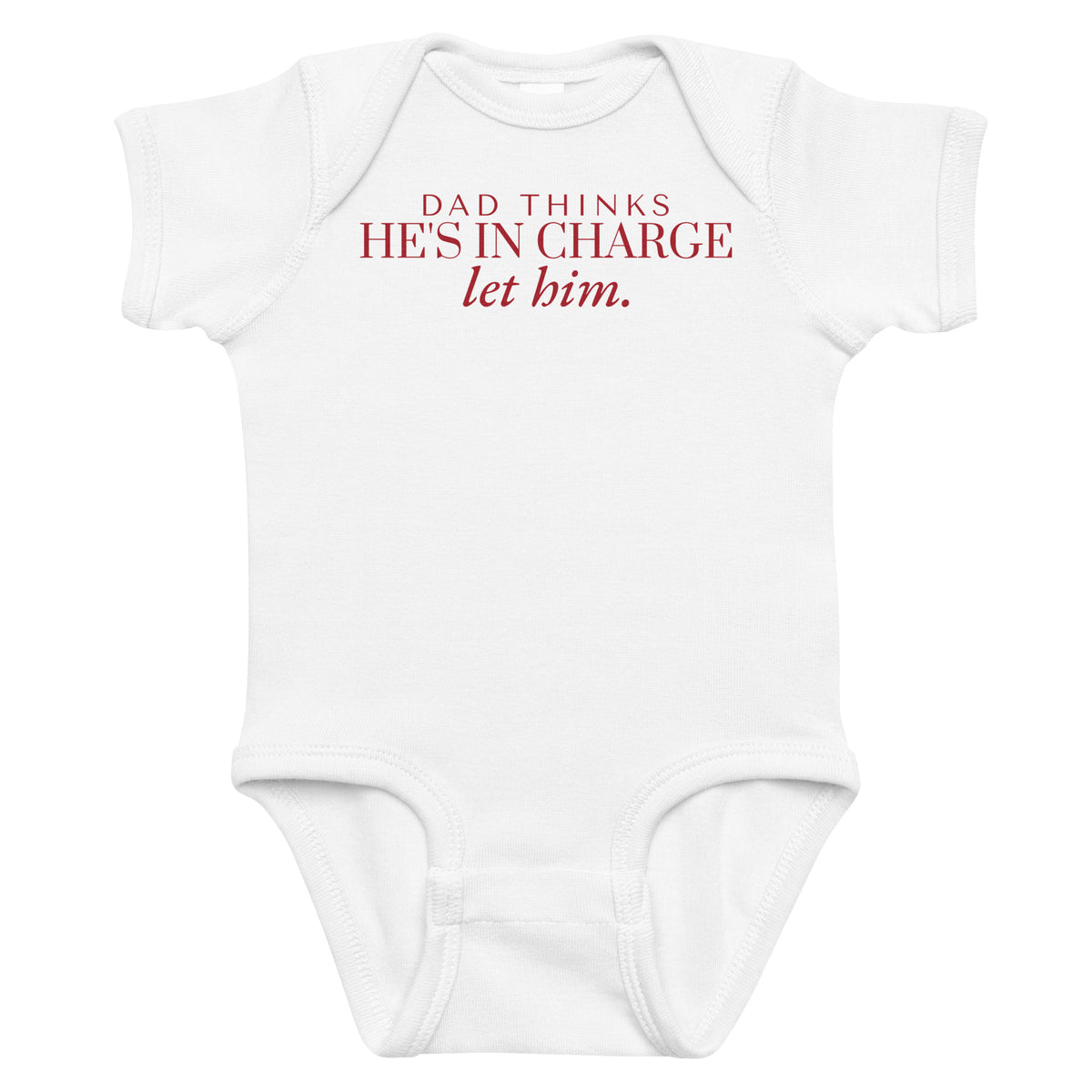 White baby bodysuit with Dad Thinks He's In Charge printed in red on the front