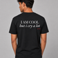 Man from behind wearing a black t shirt with I Am Cool But I Cry A Lot printed on the back