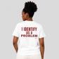 Woman from behind wearing a white t shirt with I Identify As A Problem printed on the back