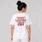 Woman from behind wearing a white t shirt with I Don't Care How Many Girls Make Him Laugh I Made Him Cry printed on the back