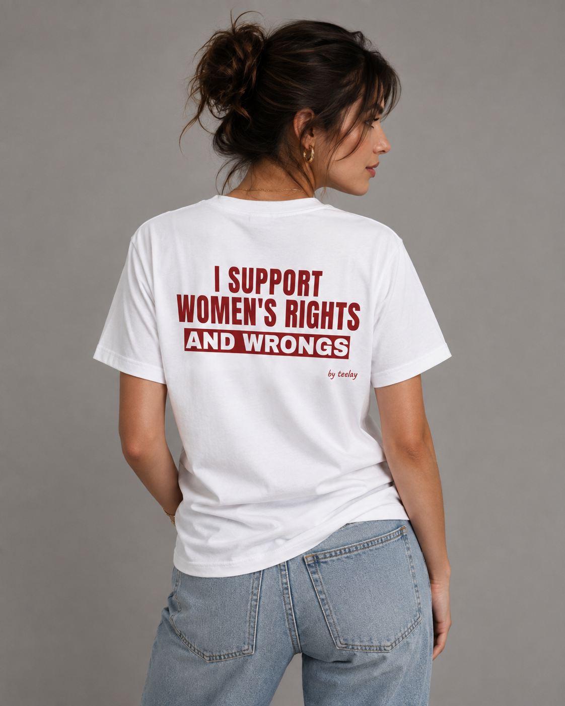 Woman from behind wearing a white t shirt with I Support Women's Rights And Wrongs printed on the back