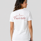 Woman from behind wearing a white t shirt with I'm Mom's Favorite printed on the back