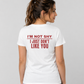 Woman from behind wearing a white t shirt with I'm Not Shy I Just Don't Like You printed on the back