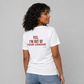 Woman from behind wearing a white t shirt with Yes I'm Out Of Your League printed on the back